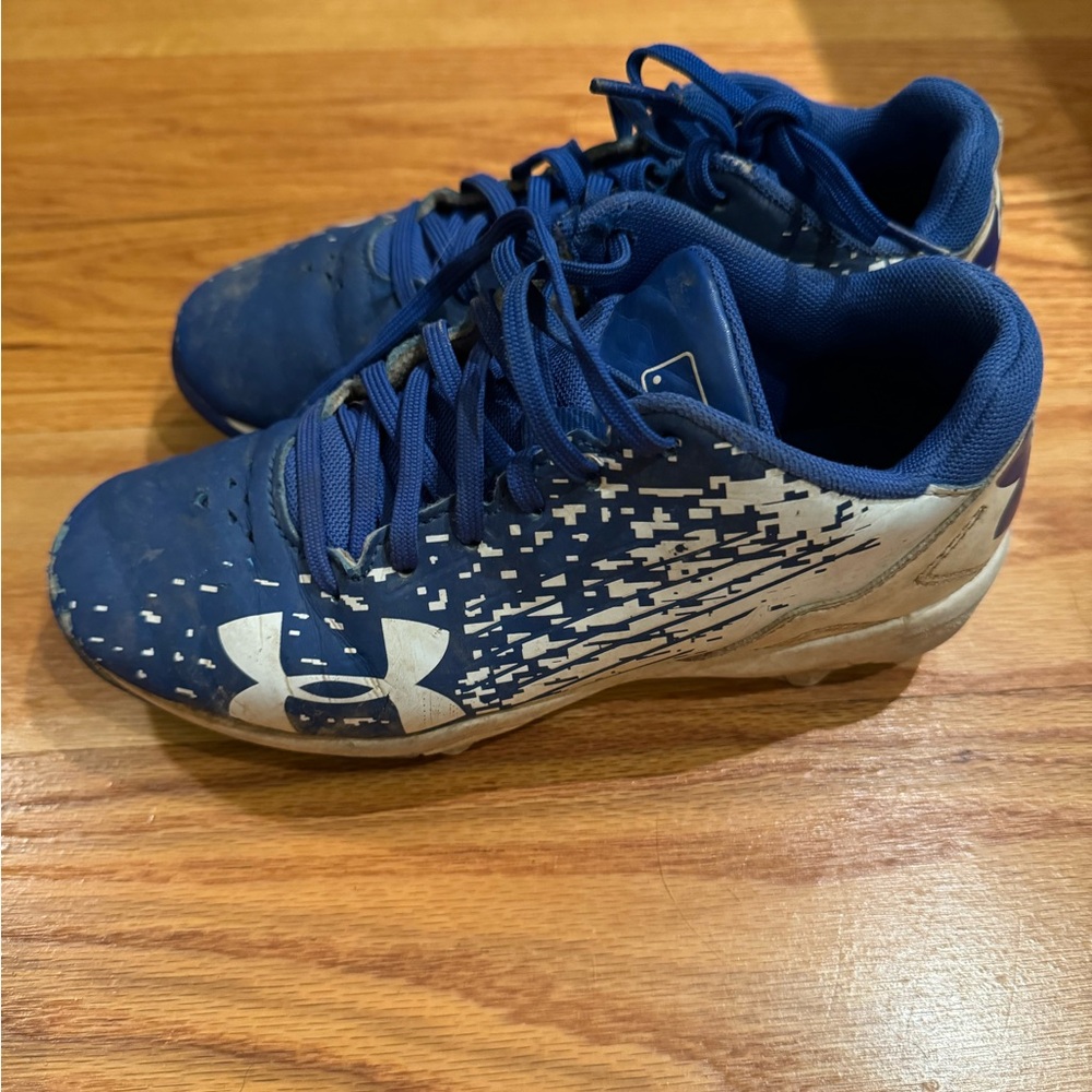 Under armor blue baseball cleats size 1